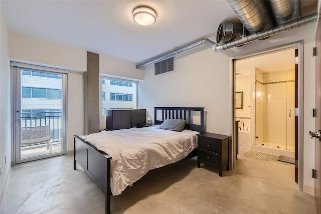 bedroom featuring ensuite bath, access to outside, visible vents, and concrete flooring