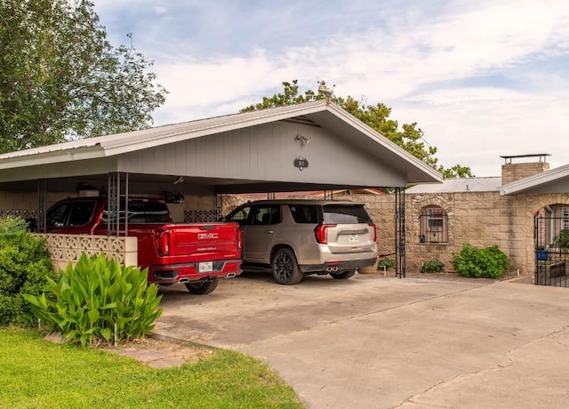 view of parking / parking lot with a carport