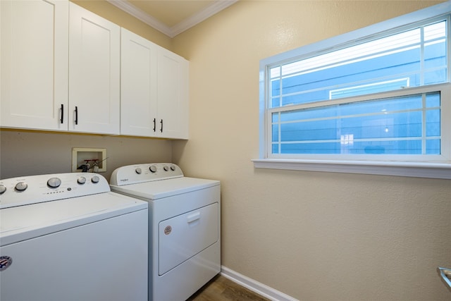 laundry area with cabinets, dark wood-type flooring, separate washer and dryer, and plenty of natural light