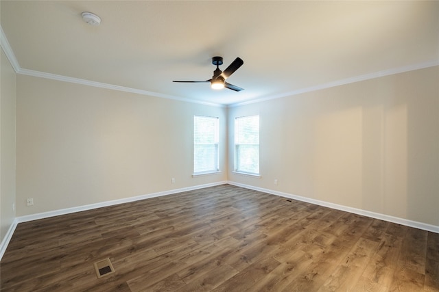 unfurnished room with a ceiling fan, baseboards, ornamental molding, and wood finished floors