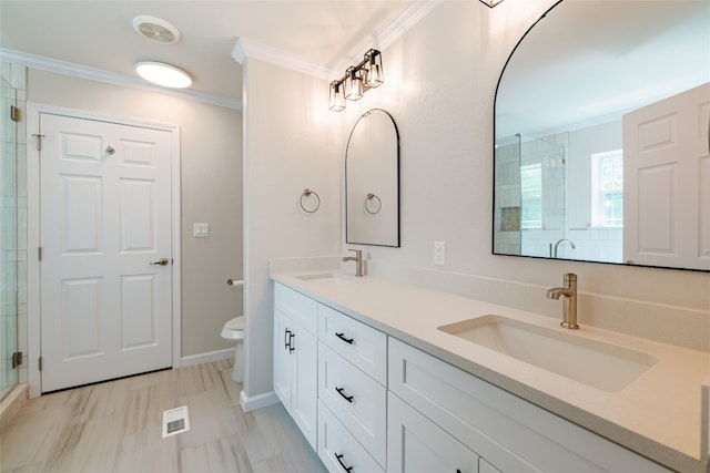 full bath with ornamental molding, a stall shower, a sink, and visible vents