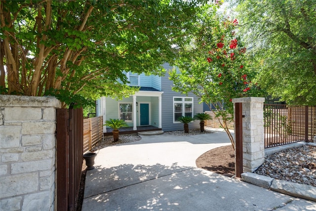 exterior space with a fenced front yard