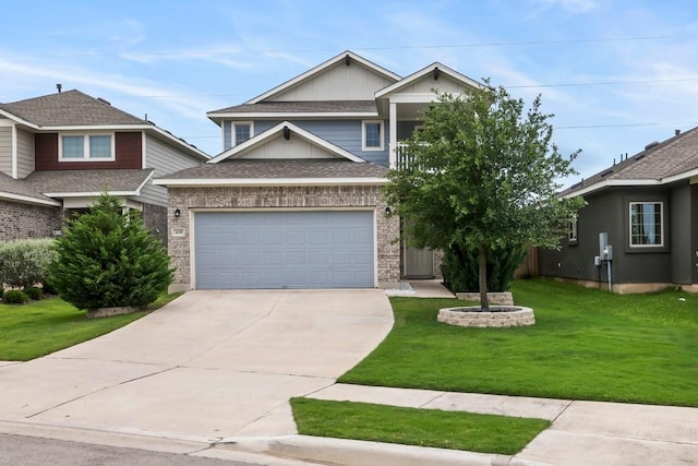 view of front of home with a garage and a front yard