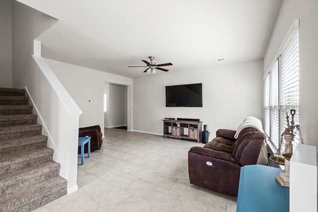 living room with ceiling fan