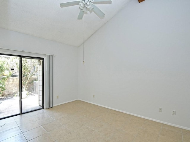 tiled empty room featuring ceiling fan and high vaulted ceiling