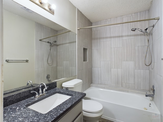 full bathroom with toilet, a textured ceiling, shower / washtub combination, and vanity