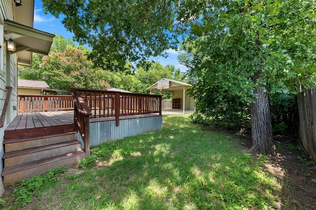 view of yard with a wooden deck