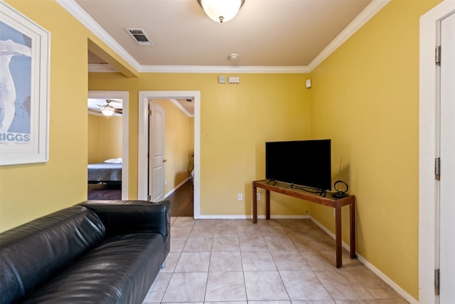 living room featuring crown molding, ceiling fan, and light tile floors