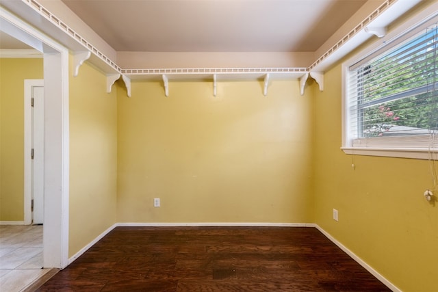 spacious closet featuring hardwood / wood-style flooring