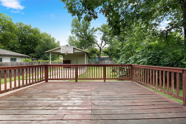 wooden deck featuring an outdoor structure