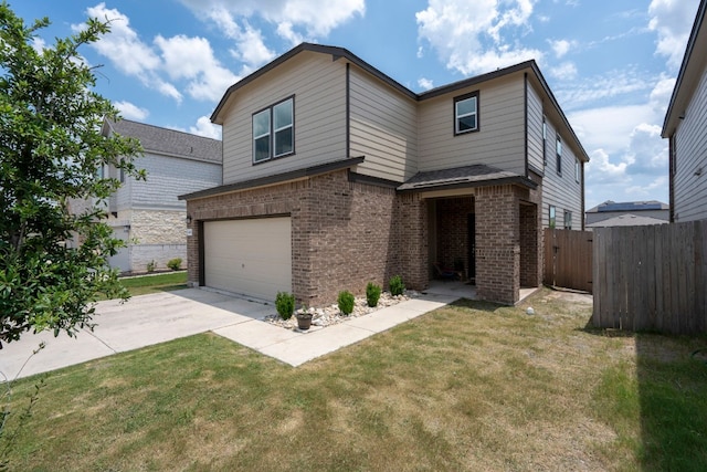 view of front of house with a garage and a front yard