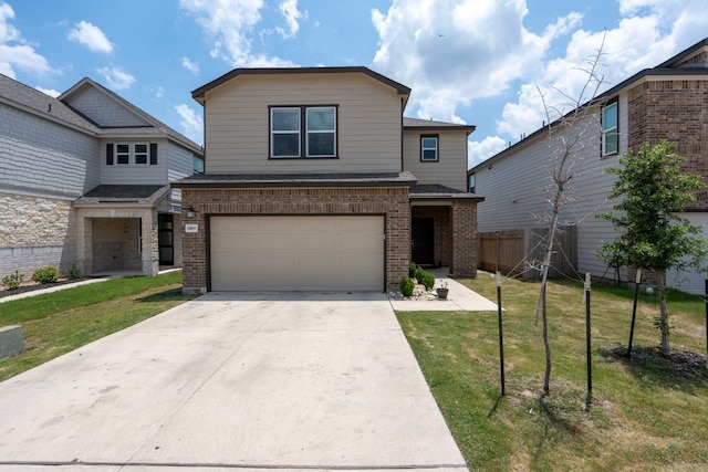 front facade featuring a front yard and a garage