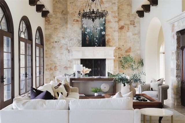 living room featuring french doors and plenty of natural light