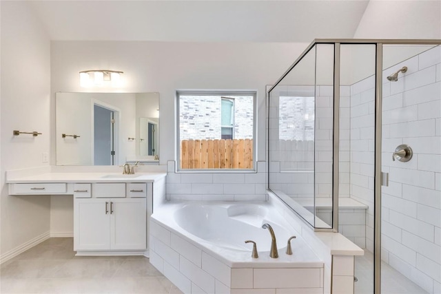 bathroom with tile patterned floors, vanity, and shower with separate bathtub