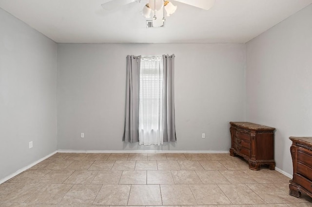 unfurnished room featuring ceiling fan