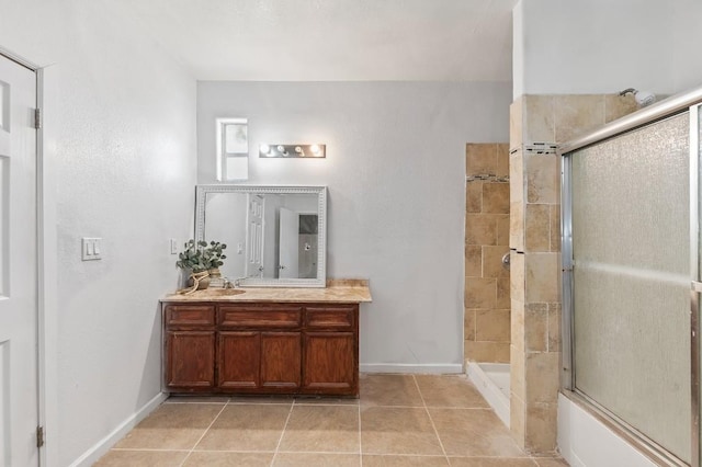 bathroom featuring tile patterned floors and vanity