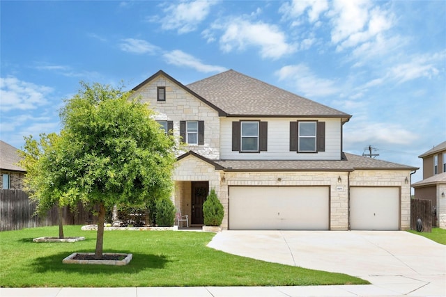 view of front facade featuring a garage and a front lawn