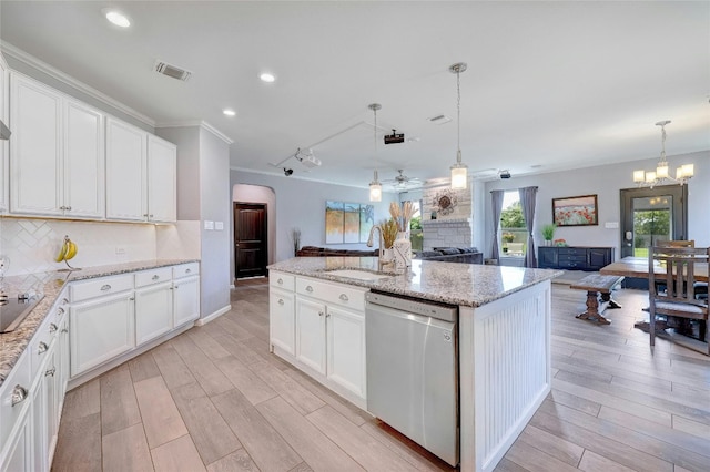 31451 Kingsway Rd, Georgetown, TX 78628 - kitchen featuring open floor plan, stainless steel dishwasher, backsplash, crown molding, and recessed lighting