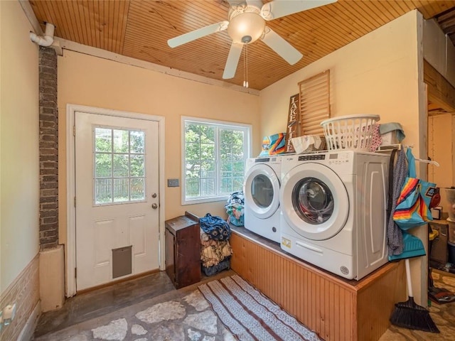 washroom with washer and dryer, ceiling fan, and wood ceiling