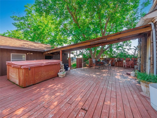 deck with a hot tub