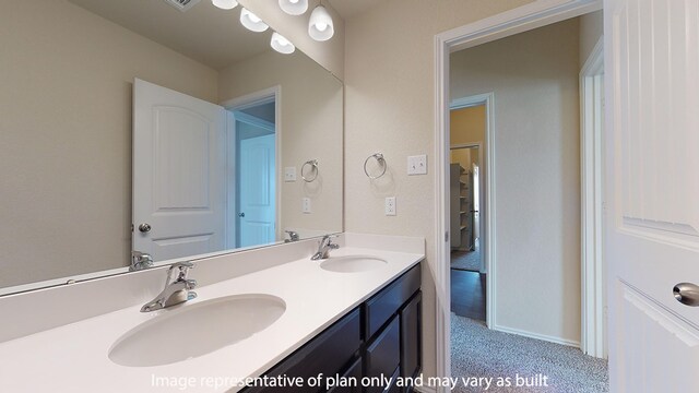 bathroom featuring dual bowl vanity