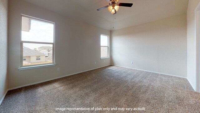 spare room featuring carpet and ceiling fan