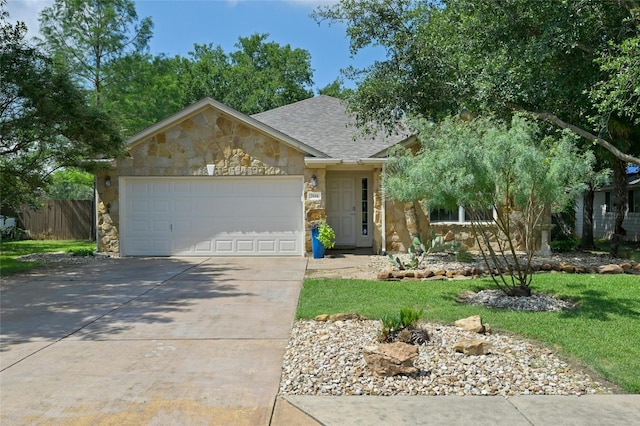 ranch-style house featuring a garage