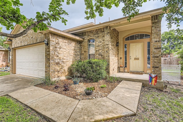 doorway to property featuring a garage