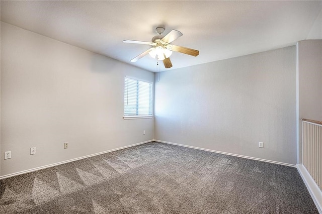 unfurnished room featuring ceiling fan and carpet floors