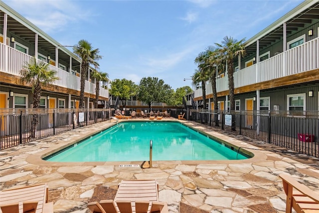 view of pool with a patio area