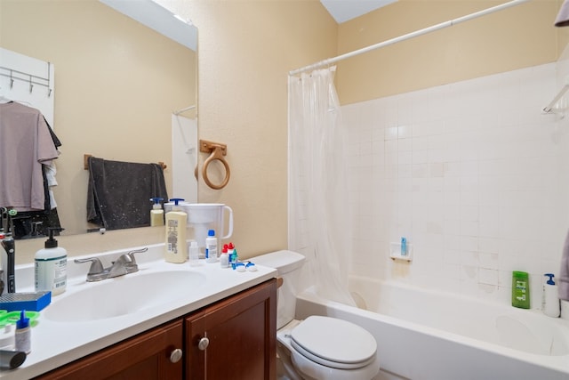 full bathroom featuring shower / bathtub combination with curtain, toilet, and vanity