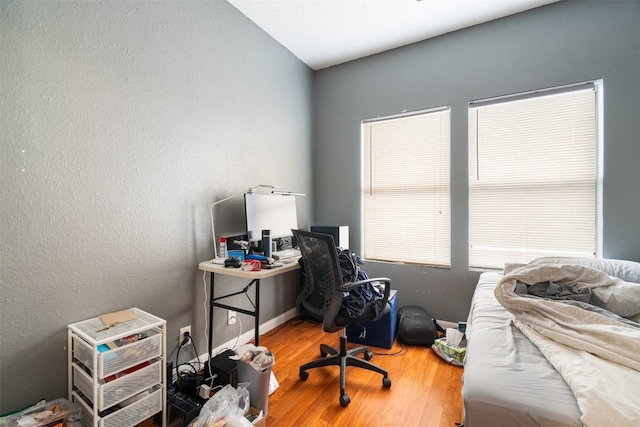 office area with hardwood / wood-style flooring