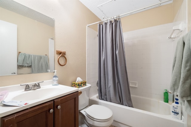 full bathroom with shower / tub combo, a textured ceiling, toilet, and vanity