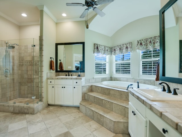 bathroom featuring shower with separate bathtub, vanity, ceiling fan, and lofted ceiling