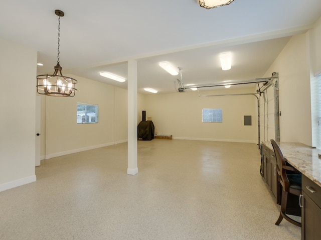 basement featuring a chandelier