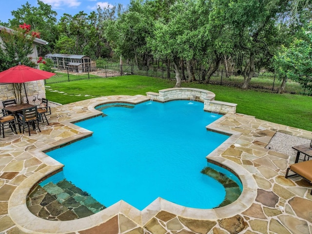 view of swimming pool featuring a yard and a patio