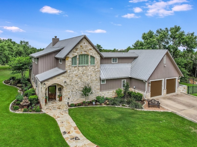 view of front facade featuring a front yard and a garage