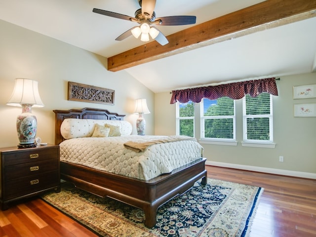 bedroom with vaulted ceiling with beams, ceiling fan, and dark wood-type flooring