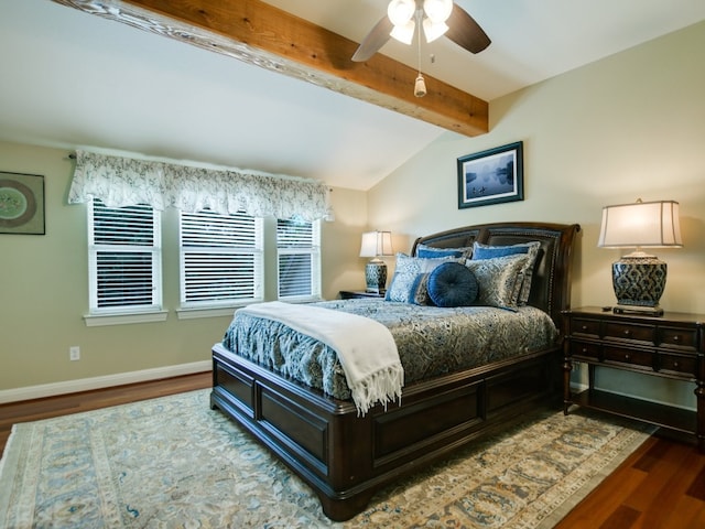 bedroom with vaulted ceiling with beams, ceiling fan, and dark hardwood / wood-style floors