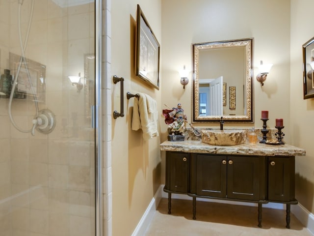 bathroom with vanity and walk in shower