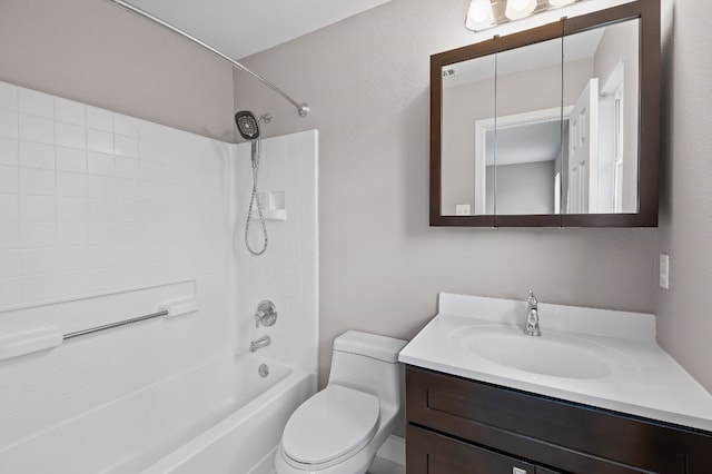 full bathroom with toilet, vanity, and tub / shower combination