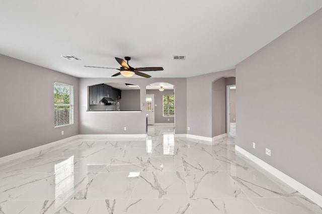 empty room featuring ceiling fan