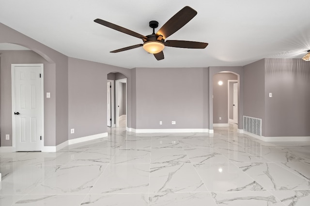 spare room featuring ceiling fan