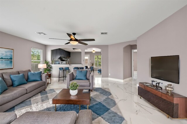 living room with ceiling fan