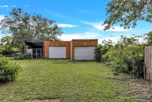 view of yard with a garage