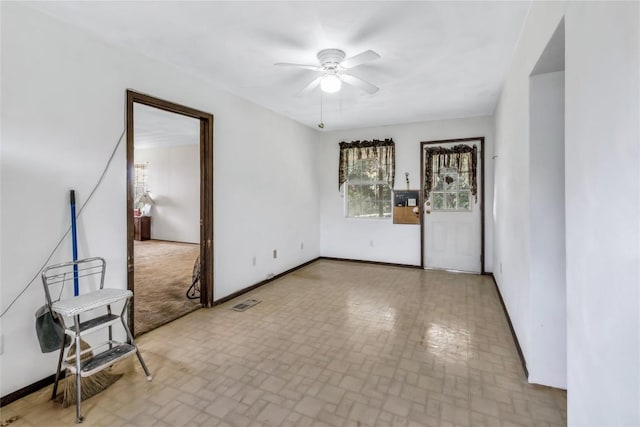 empty room with ceiling fan