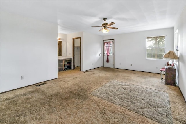 interior space featuring ceiling fan