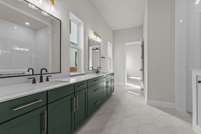 bathroom featuring a shower and vanity