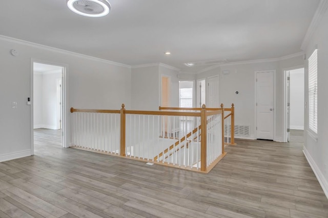 3917 Canyon Glen Cir, Austin, TX 78732 - hall featuring plenty of natural light, light wood-type flooring, and ornamental molding
