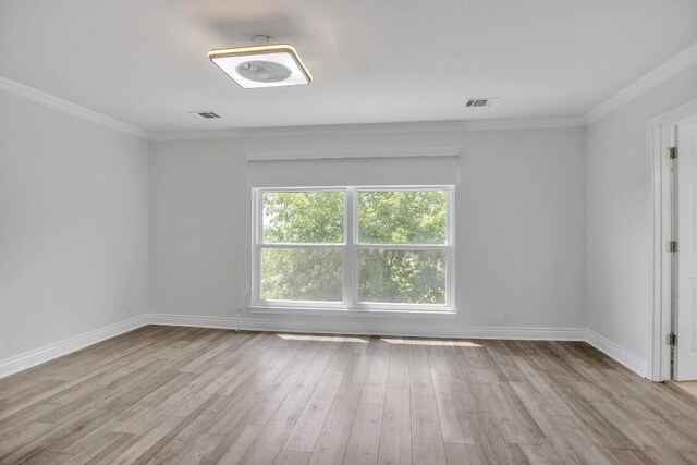 3917 Canyon Glen Cir, Austin, TX 78732 - empty room featuring light hardwood / wood-style floors and ornamental molding